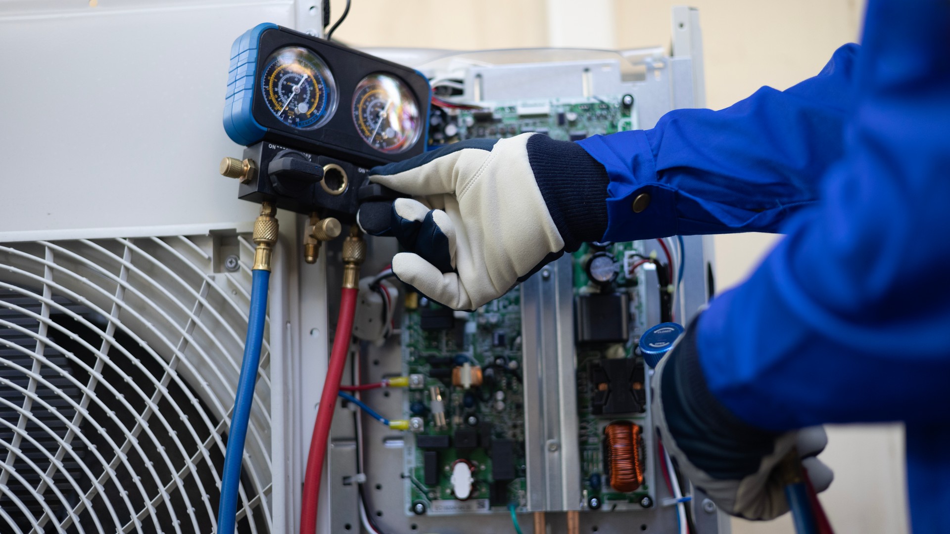 Close-up Air conditioner technician hand check  fill refrigerant liquid and maintenance condenser unit, Home care service